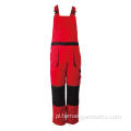 Czerwono-czarne zimowe spodnie na szelkach